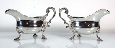 Lot 445 - A pair of George II silver sauce boats, each...