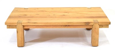Lot 474 - A contemporary Polish oak low coffee table by...