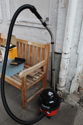 Lot 825 - Henry tug along vacuum cleaner with hose, pole...