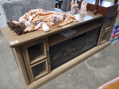 Lot 1148 - Wood finish electric powered log effect fire...