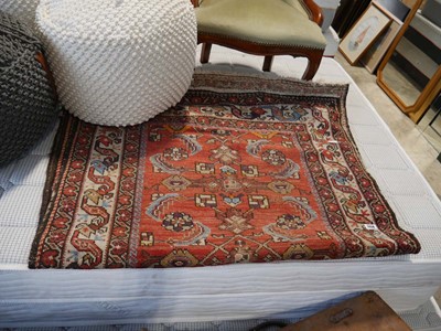 Lot 1158 - Woollen figured and bordered red rug