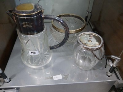 Lot 1167 - Cut glass pourer with plated handle and spout,...