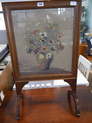 Lot 1174 - Dark oak framed free standing tapestry fire...