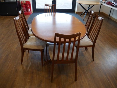 Lot 1180 - Mid-century teak oval extending dining table...
