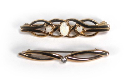 Lot 670 - A 9ct yellow gold brooch of openwork design...