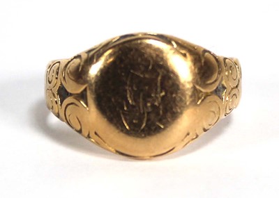 Lot 675 - An 18ct yellow gold signet ring with scrolled...