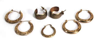 Lot 685 - Three pairs of 9ct yellow gold and yellow...