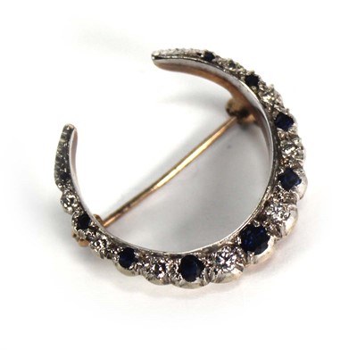 Lot 703 - A yellow metal and white metal highlighted...