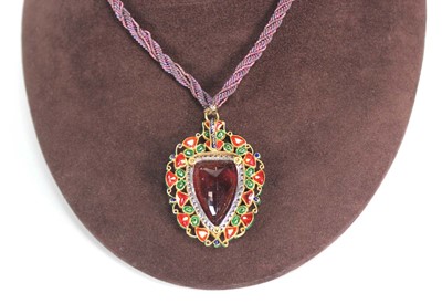 Lot 705 - A Mogul style pendant necklace, the yellow and...