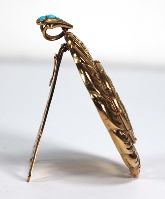 Lot 708 - A yellow metal openwork pendant of imposing...