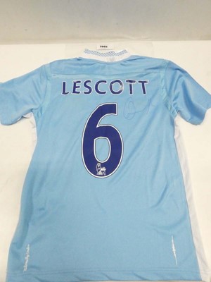 Lot 2065 - Man City football shirt '6 Lescott' bearing...