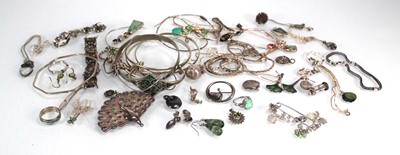 Lot 730 - A group of silver and metalware jewellery...