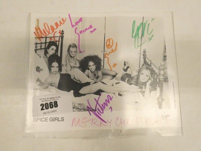 Lot 2068 - Photo of Spice Girls bearing signatures...