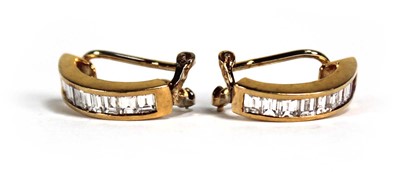 Lot 743 - A pair of 18ct yellow gold ear clips, each set...