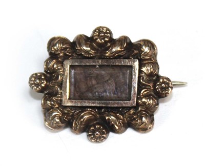 Lot 747 - A 19th century gilt metal mourning brooch, the...