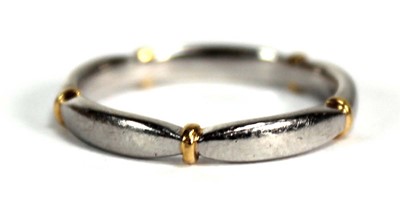 Lot 750 - A platinum and yellow gold highlighted wedding...