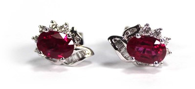 Lot 752 - A pair of 18ct white gold ear studs of...