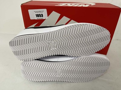Lot 1053 - Nike kids cortez trainers in white size UK6 -...