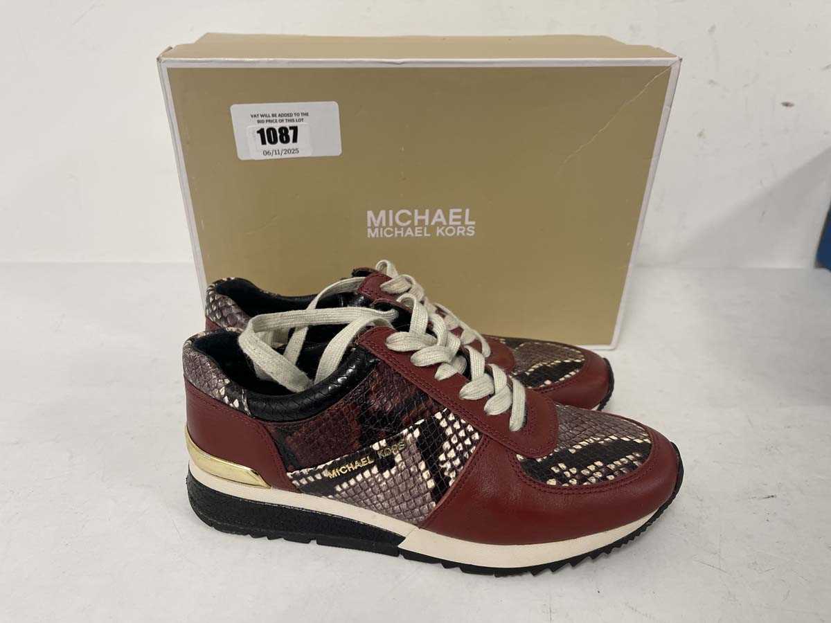 Lot 1087 - Michael Kors allie wrap trainers in brown size...