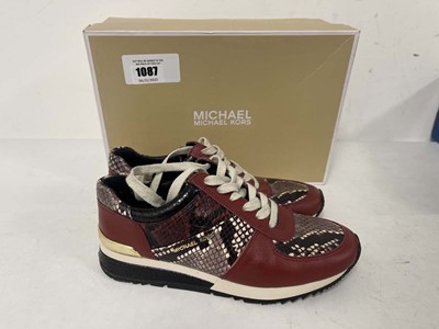 Lot 1087 - Michael Kors allie wrap trainers in brown size...