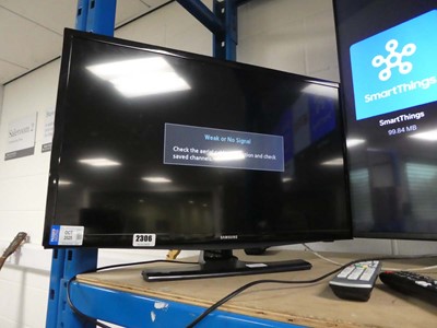 Lot 2306 - Samsung 28" TV (UE28J4100AK) with stand and...