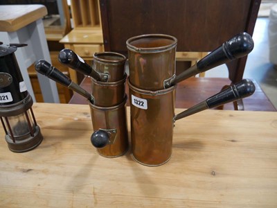 Lot 1322 - Graduated set of copper pourers