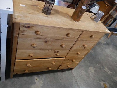 Lot 1325 - Modern pine chest with an arrangement of 10...
