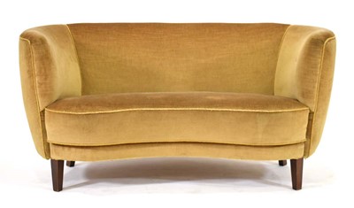 Lot 518 - A 1950/60's Danish 'Banana' sofa in green...