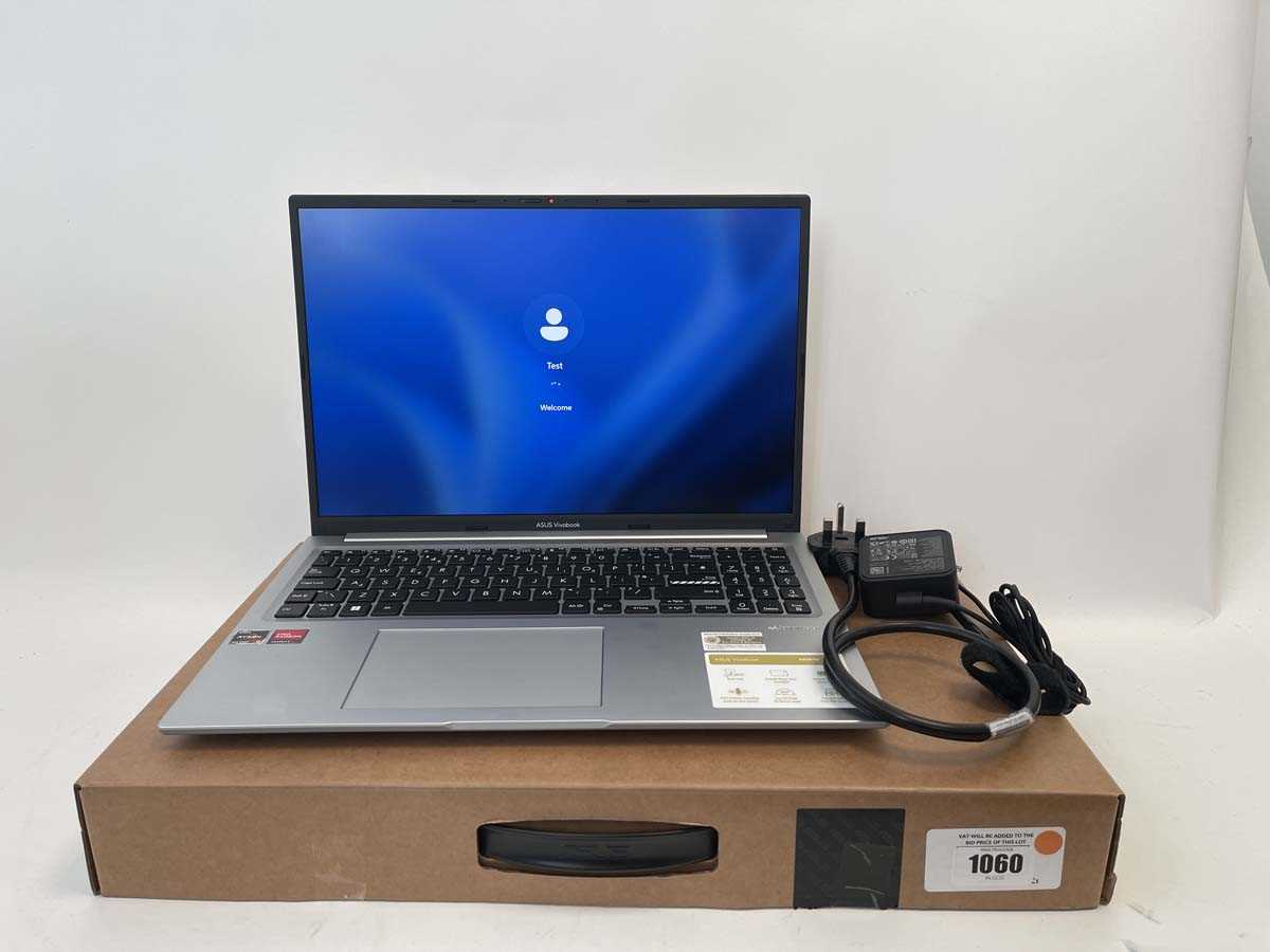 Lot ASUS Vivobook laptop model M1605Y, AMD...