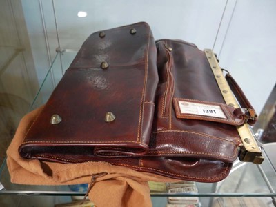 Lot 1381 - Tuscan leather luggage bag with dust cover