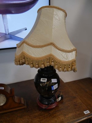 Lot 1385 - Oriental black base and gild decorated table...