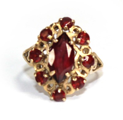 Lot 776 - A French gold cluster ring set red glass, ring...