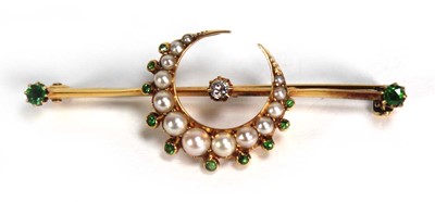 Lot 778 - A 15ct yellow gold bar brooch of crescent moon...