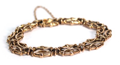 Lot 786 - A yellow metal oval hollowlink bracelet, 16.2 gms