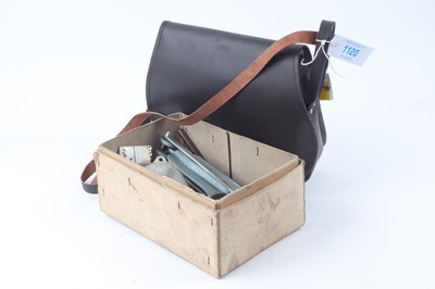 Lot 1120 - Leather cartridge bag, together with a box of...