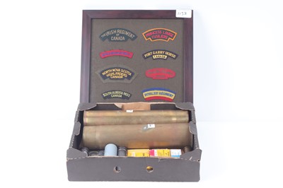 Lot 1133 - Tray of WWI 75mm brass cases, various inert...