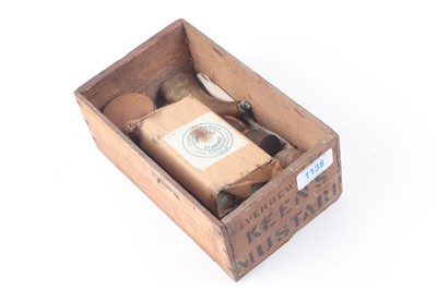 Lot 1138 - Wooden box containing vintage Joyce tins, a...