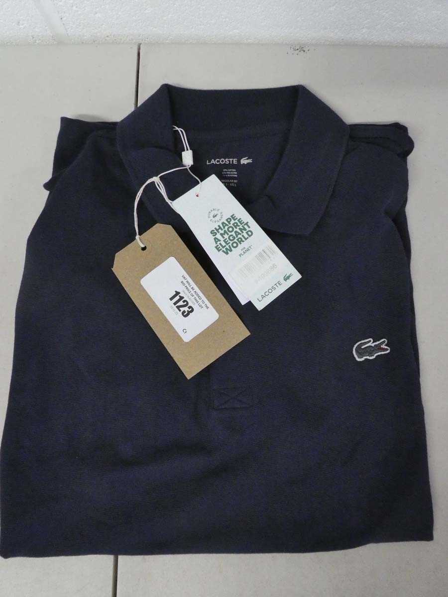 Lot 1123 - Lacoste polo top in navy size - FR 5 US L