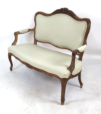 Lot 9 - A Louis XVI-style walnut and upholstered...
