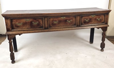 Lot 14 - An 18th century oak dresser base with three...