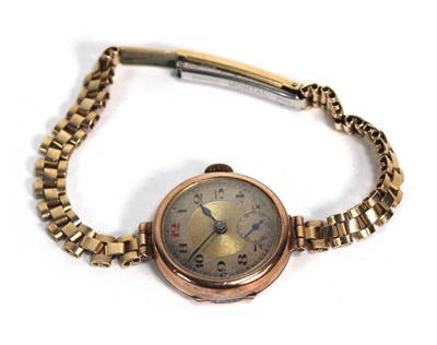Lot 957 - A ladies 9ct yellow gold wristwatch, the...