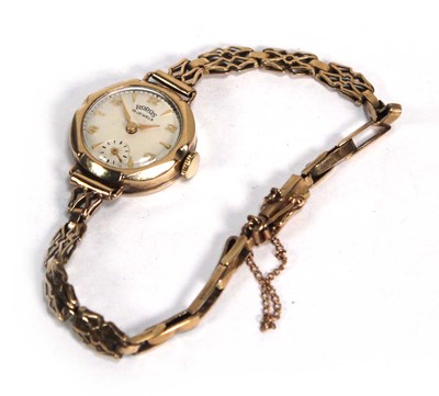 Lot 958 - A ladies 9ct yellow gold wristwatch by Rodos,...