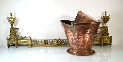 Lot 185 - A 19th century brass fire curb surmounted by a...