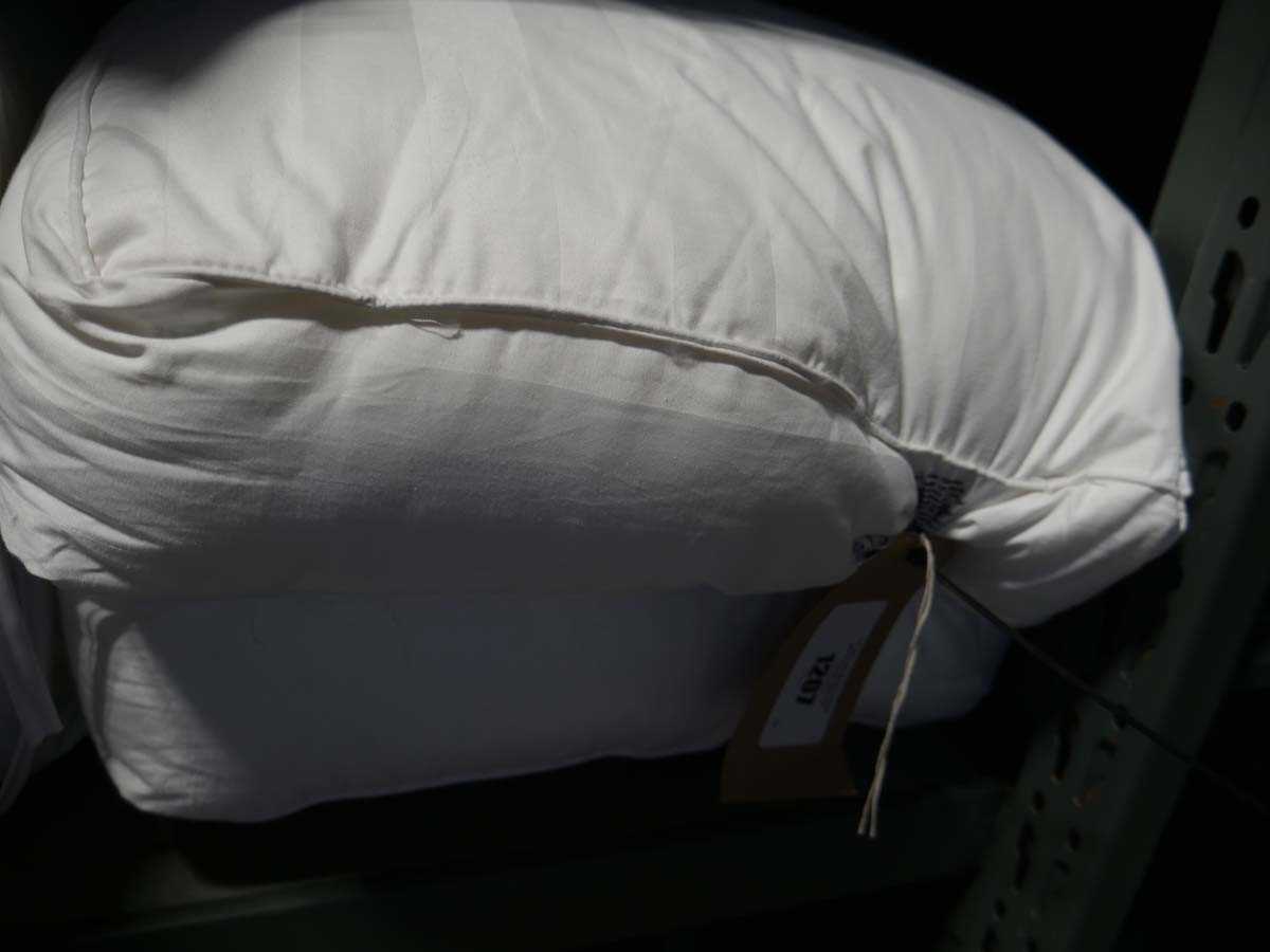 Lot 1207 - Snuggledown side sleeper pillow pair