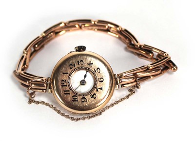 Lot 965 - A ladies 9ct rose gold half hunter wristwatch,...