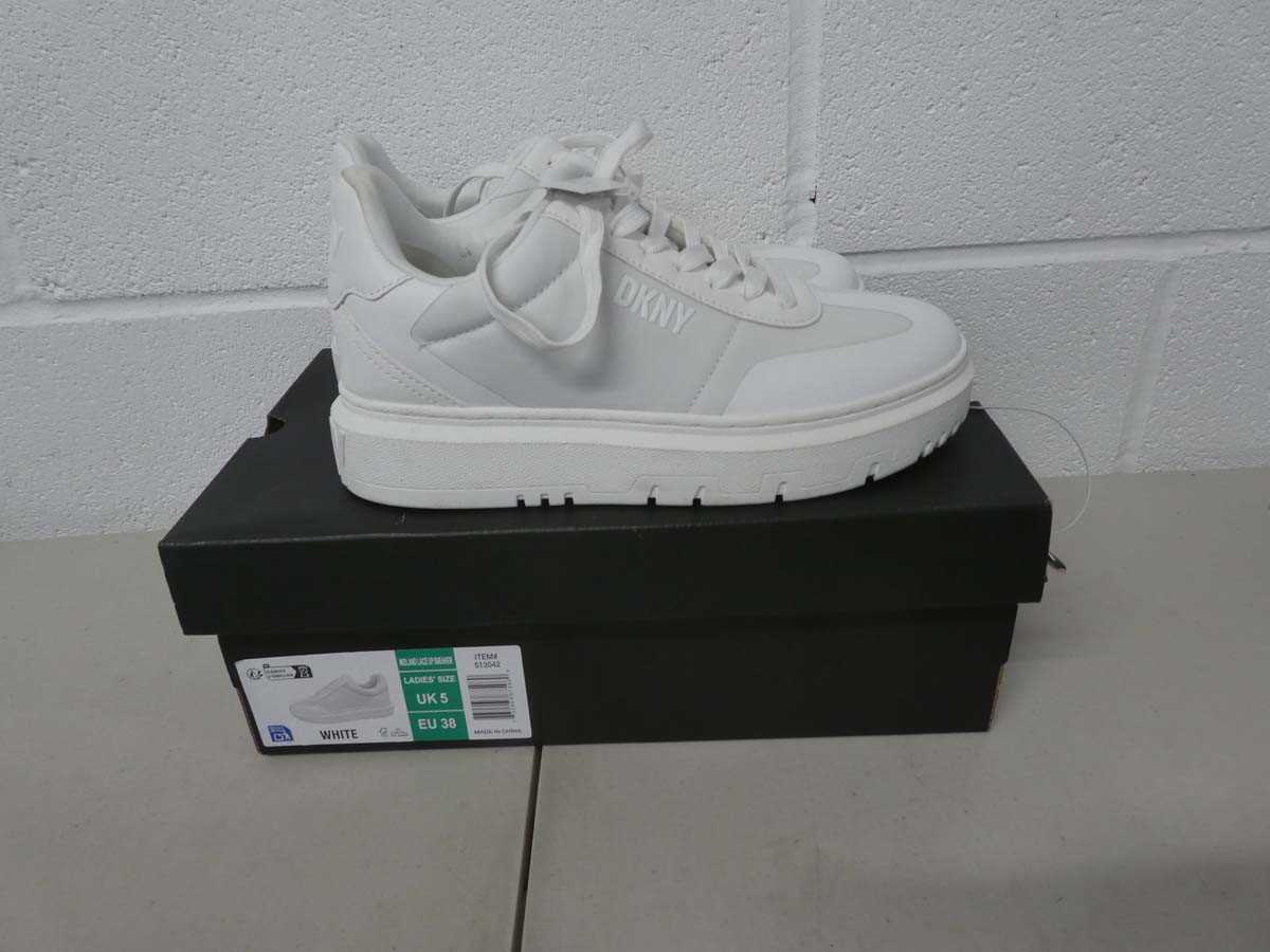 Lot 1266 - Boxed pair of DKNY trainers size UK 5