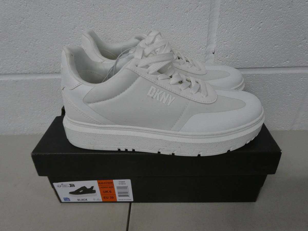 Lot 1268 - Boxed pair of DKNY trainers size UK 7