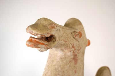 Lot 202 - A Chinese pottery figure modelled as a...