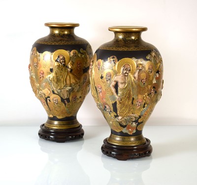 Lot 204 - A pair of Japanese Satsuma ware baluster vases...