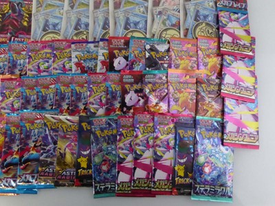 Lot Approximately 100 Assorted Pokémon Booster...